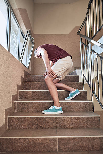 istock Man having an injury on the staircase. 2237056842
