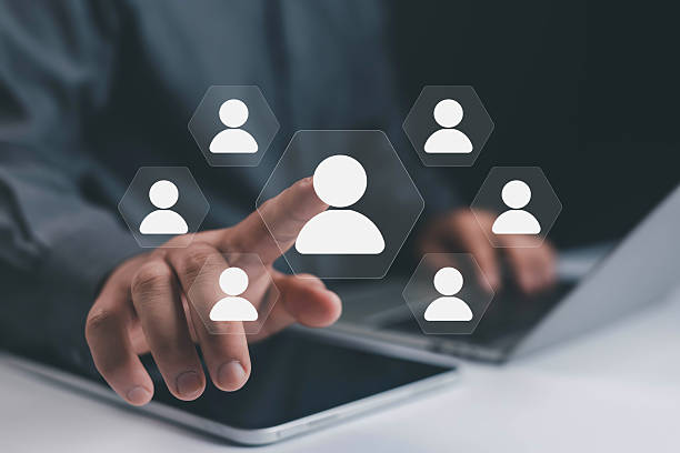 istock Businessman selecting digital user profile icon on virtual screen, concept of recruitment, human resources, workforce management, employee selection, talent acquisition, online networking, digital HR 2237058212