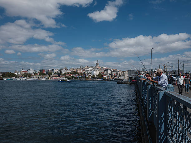 Istanbul, Turkey - 09/14/2025: Scenic view of Galata Bridge with iconic Galata Tower in Istanbul