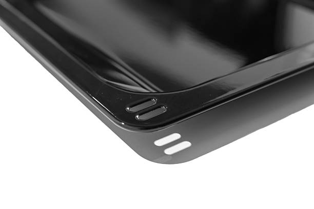 istock A close-up of a clean, empty black metal baking sheet on a white background 2237060763
