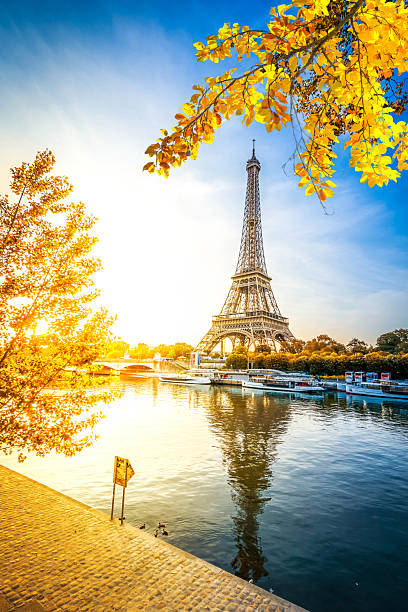istock eiffel tour over Seine river 2237063148