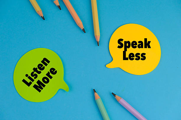 istock Speak Less Listen More. Two speech bubbles on a blue background. 2237068654