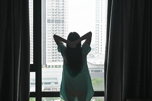 istock Serene Sunrise: Woman Enjoying Peaceful Morning Moments 2237070708