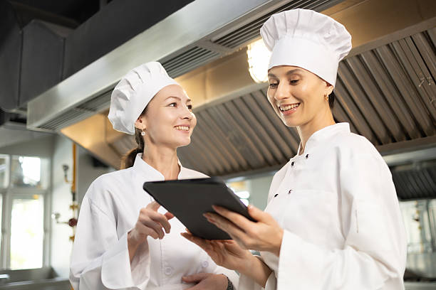 istock Woman Chef assisting a cooking class and explaining some tips and tricks 2237072414