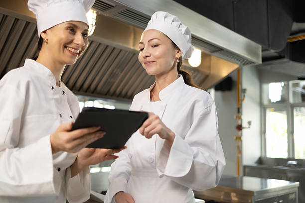 istock Woman Chef assisting a cooking class and explaining some tips and tricks 2237072416