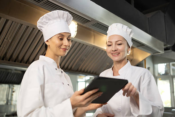 istock Woman Chef assisting a cooking class and explaining some tips and tricks 2237072417