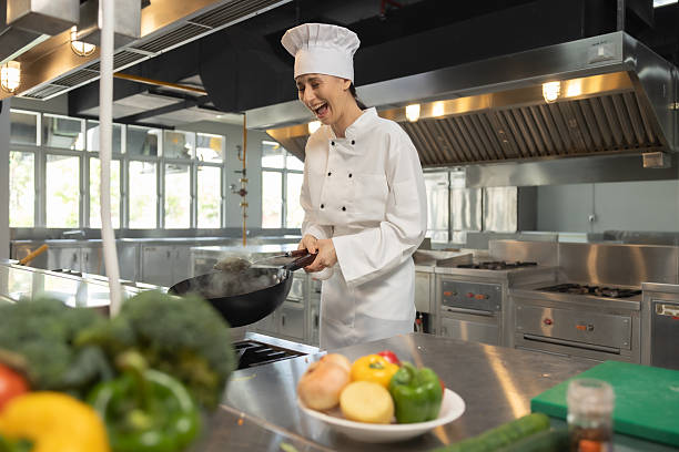 istock Woman Chef assisting a cooking class and explaining some tips and tricks 2237072513