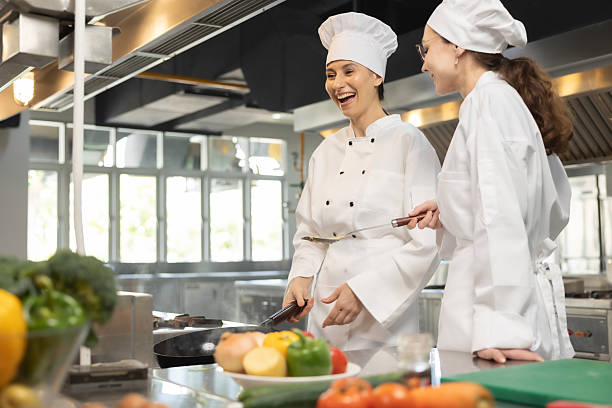 istock Woman Chef assisting a cooking class and explaining some tips and tricks 2237072573