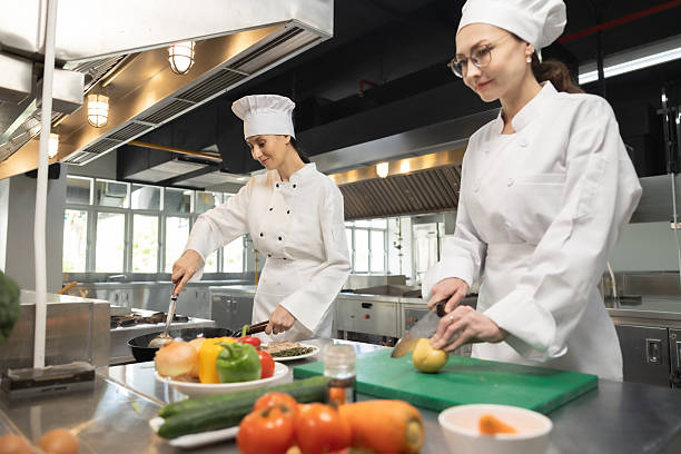 istock Woman Chef assisting a cooking class and explaining some tips and tricks 2237072592