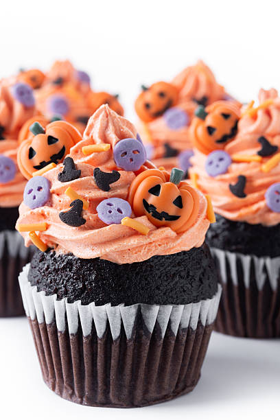 istock Halloween cupcakes with pumpkin sprinkles 2237079418