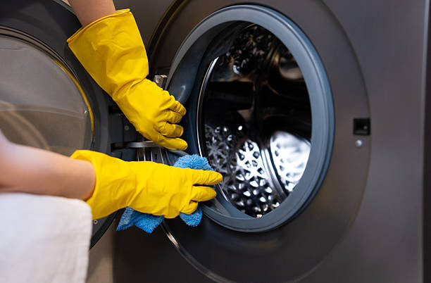 istock Wiping washing machine door 2237084214