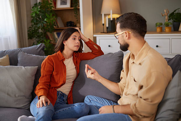 istock Couple discussing relationship problems on a couch at home 2237085266