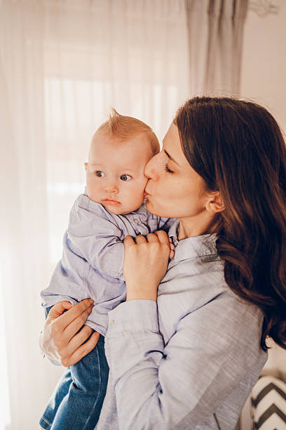 istock Mother hug her baby 2237085338