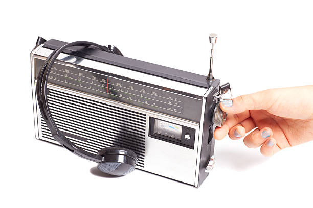 istock Hand tuning radio receiver button 2237086478