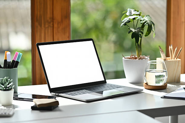 istock A Laptop with a blank screen on a desk, Minimal Workstation by the Window 2237090216