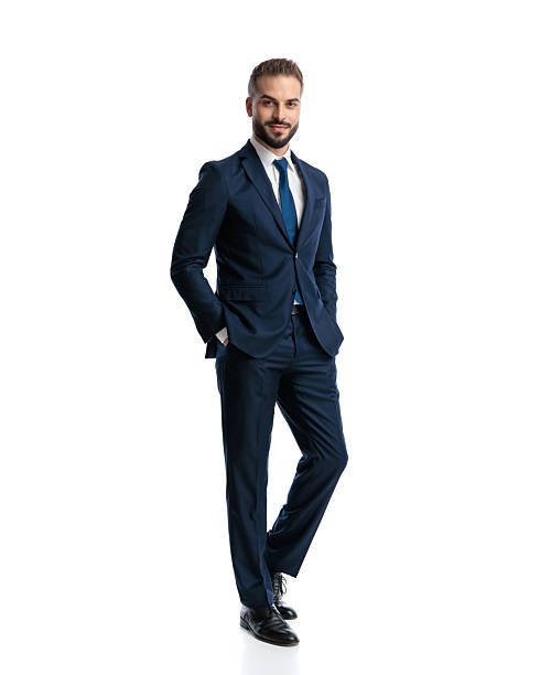 istock handsome elegant man in navy blue suit smiling and walking 2237091653