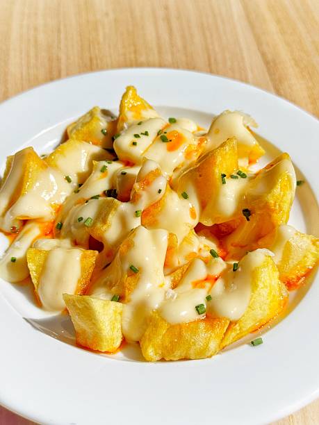 istock Typical Spanish tapas dish Patatas with spicy bravas sauce 2237097427