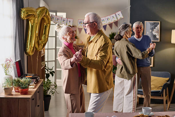 istock Senior Couples Dancing Together Celebrating Birthday Indoors 2237098025