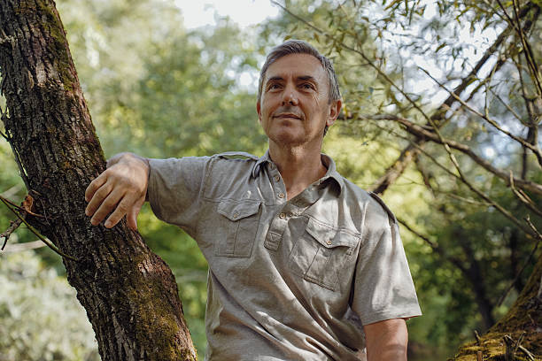 istock Senior Hiker Exploring Nature and Enjoying River Landscape 2237103767