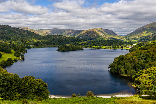 istock Cloudy Sky over Grasmere Water and Green Hills 2237105202