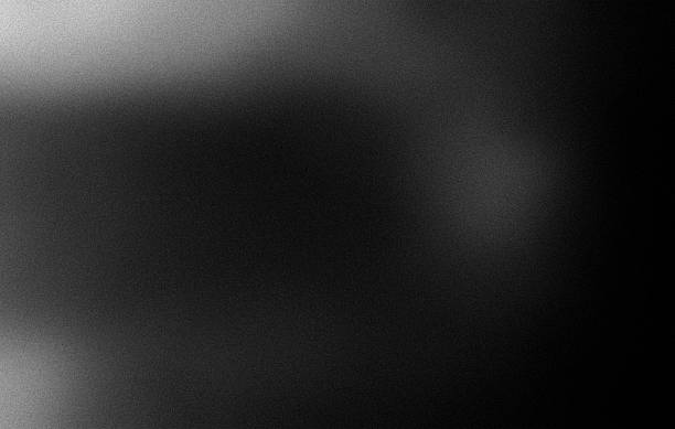istock Noisy gradeint black gray monochrome grainy plain abstract dark background with blank space 2237106371