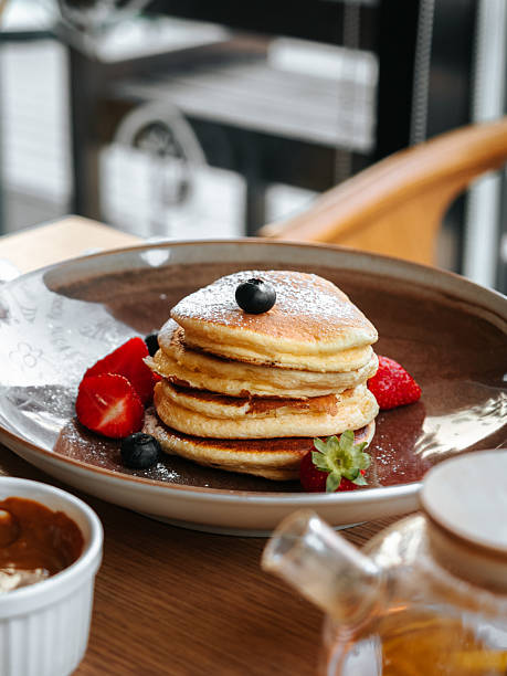 istock Pancakes with berries and chocolate sauce 2237107301