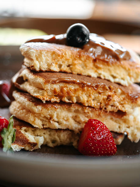 istock Pancakes with berries and chocolate sauce 2237107349