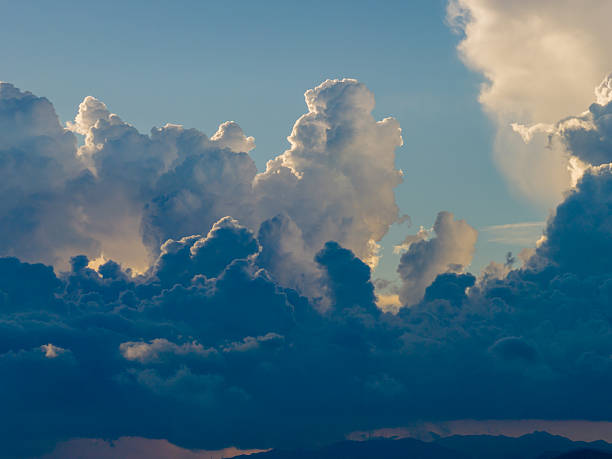 The beautiful evening sky with floating clouds