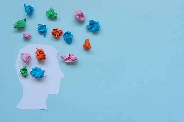 istock Positive thinking concept. Head shape and colorful paper balls 2237112497