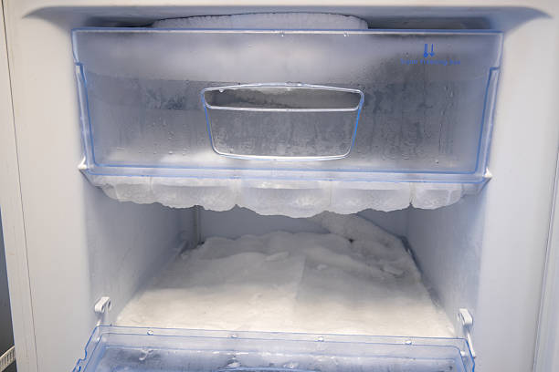 istock Frost buildup inside the freezer, with ice and condensation on surfaces. 2237113296