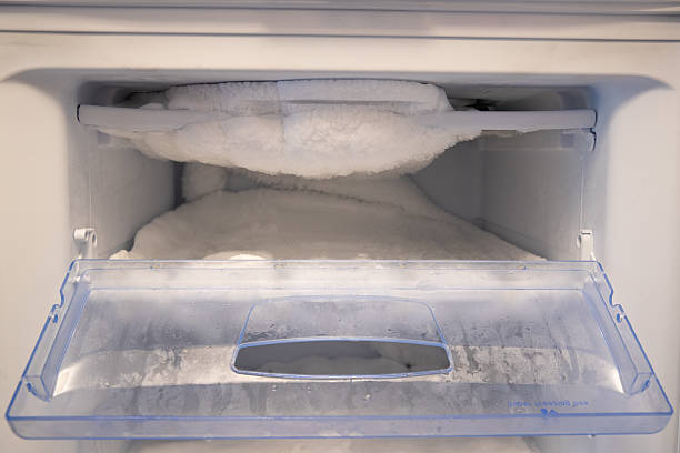 istock Frost buildup inside the freezer, with ice and condensation on surfaces. 2237113303