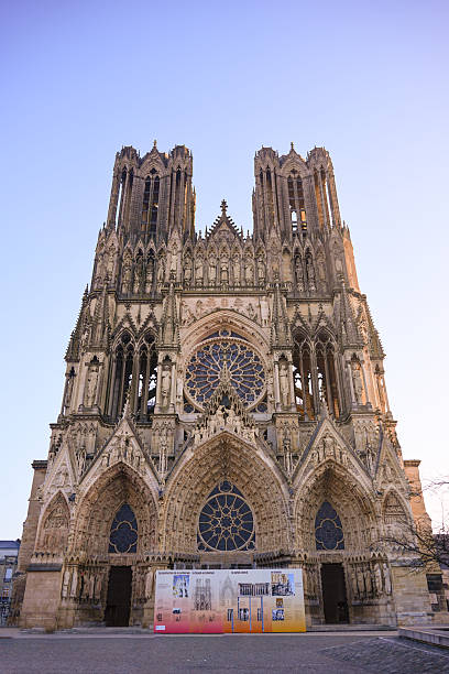 Gothic cathedral facade with towers and rose window, editorial