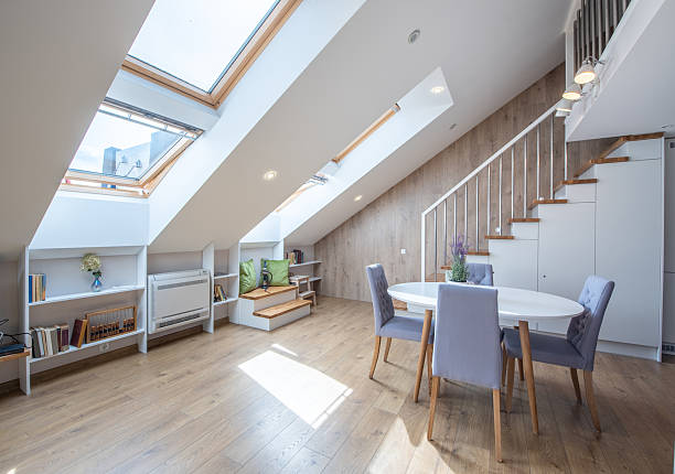 istock Bright Residential Attic Loft Apartment Interior With Skylight and Modern Stairs 2237115520