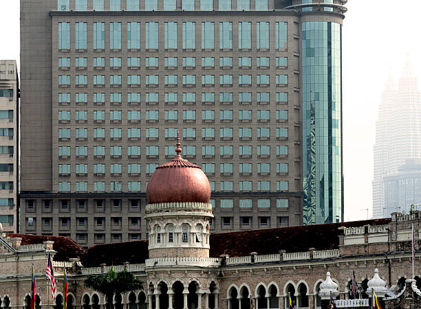 Shot in color detail on the facade of this historic building representing some character, animal or flower. Set at Kuala Lumpur, Malaysia, Asia