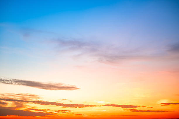 istock Beautiful , luxury soft gradient orange gold clouds and sunlight on the blue sky perfect for the background, take in evening,Twilight, Large size, high definition landscape photo 2237116276