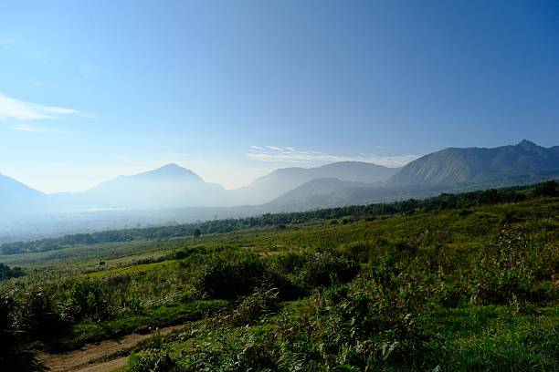 istock Serene Landscape with Green Valley and Mountains 2237119450
