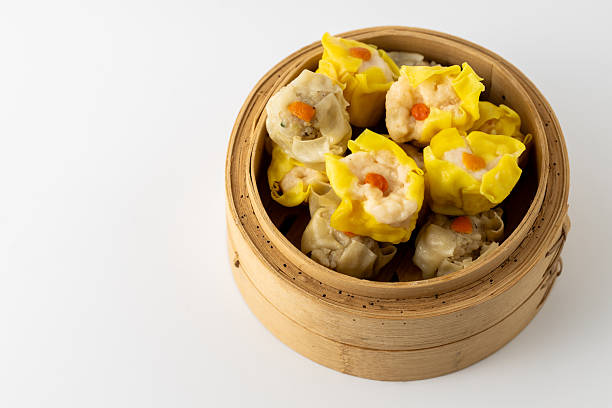 Delightful Bamboo Steamer with Colorful Dim Sum Dumplings Inside
