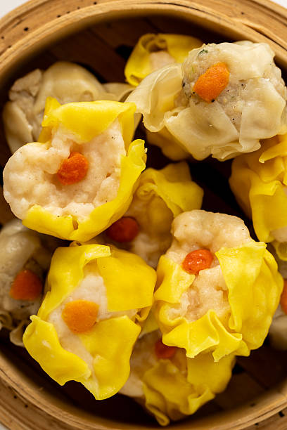 istock Delicious Dim Sum with Colorful Dumplings in Bamboo Steamer 2237126466