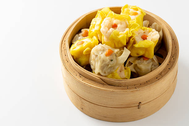 istock Freshly Steamed Dumplings in Bamboo Steamer with Vibrant Garnish 2237126511