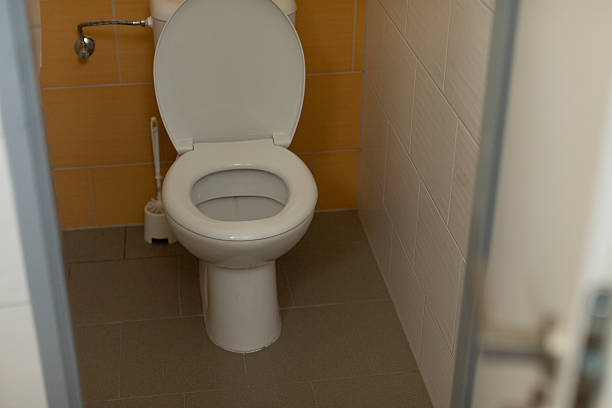 Clean White Toilet Bowl in Modern Bathroom