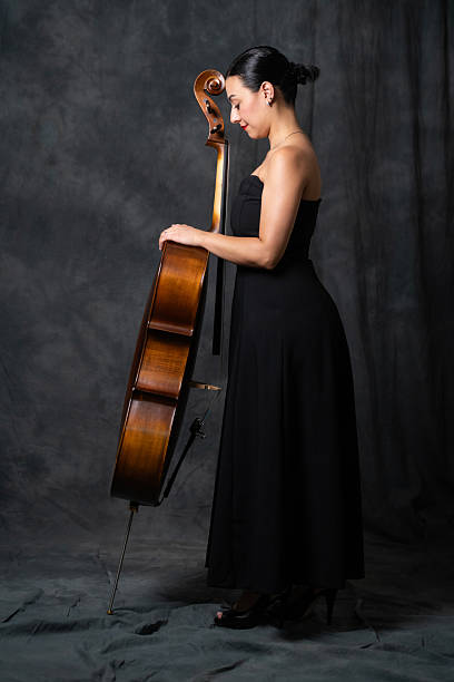 istock Female Cellist Standing with Cello 2237128826