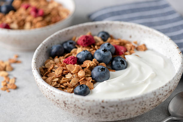 istock Greek yogurt bowl with blueberries and granola 2237129208