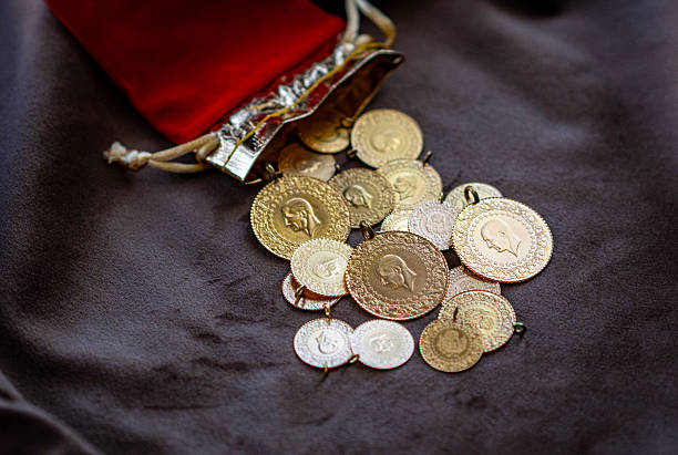 istock Traditional Turkish gold coins in red pouch 2237135060