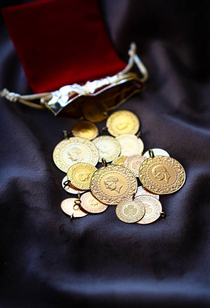 istock Traditional Turkish gold coins in red pouch 2237135080
