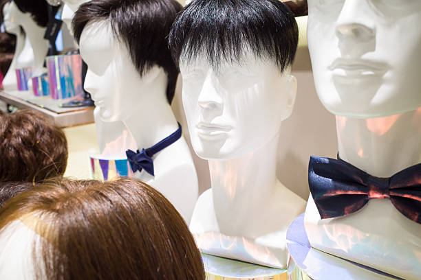 istock Wigs on display in a store 2237138443