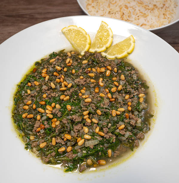 istock Spinach or Sabanekh with chicken a Mediterranean dish served with rice 2237139521