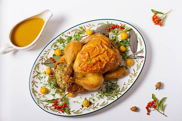 istock Roasted chicken or turkey, mashed potatoes, vegetables and pumpkin pie 2237141210