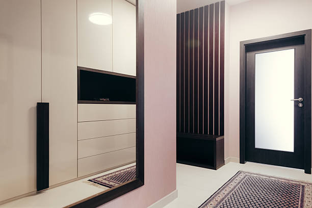 istock A Contemporary Modern Entryway Featuring a Stylish Cabinet and Mirror Design 2237141393