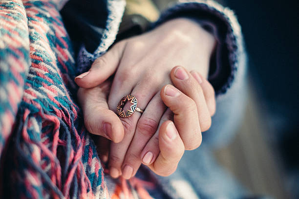 istock Connection and emotional bonding. A couple holding hands, love, attachment 2237144049