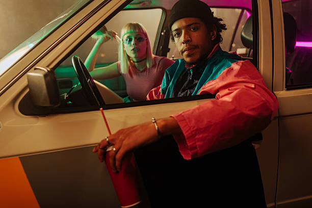 istock Couple sitting in car at drive thru. 2237144494